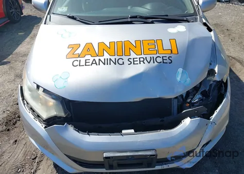 2010 Honda Insight Ex z USA, uszkodzony, nr VIN JHMZE2H75AS016902